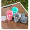 Botella de agua plegable hexagonal del viaje de la taza del silicón