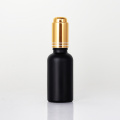 Tampa de parafuso de gatilho dourado garrafas de soro cosmético preto com conta -gotas