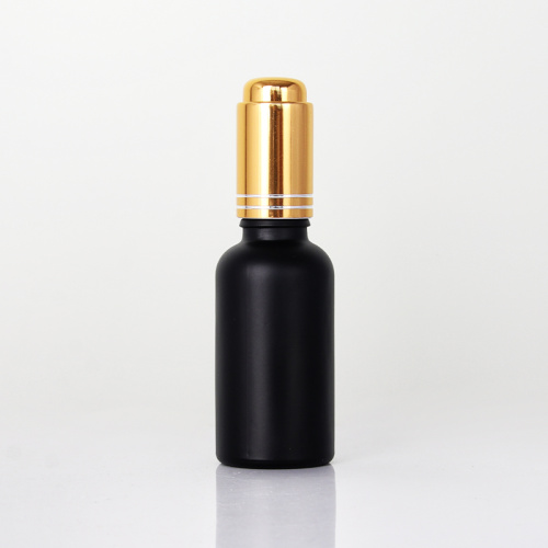 Bouchons à vis à gâchette dorée bouteilles de sérum cosmétique noire avec compte-gouttes