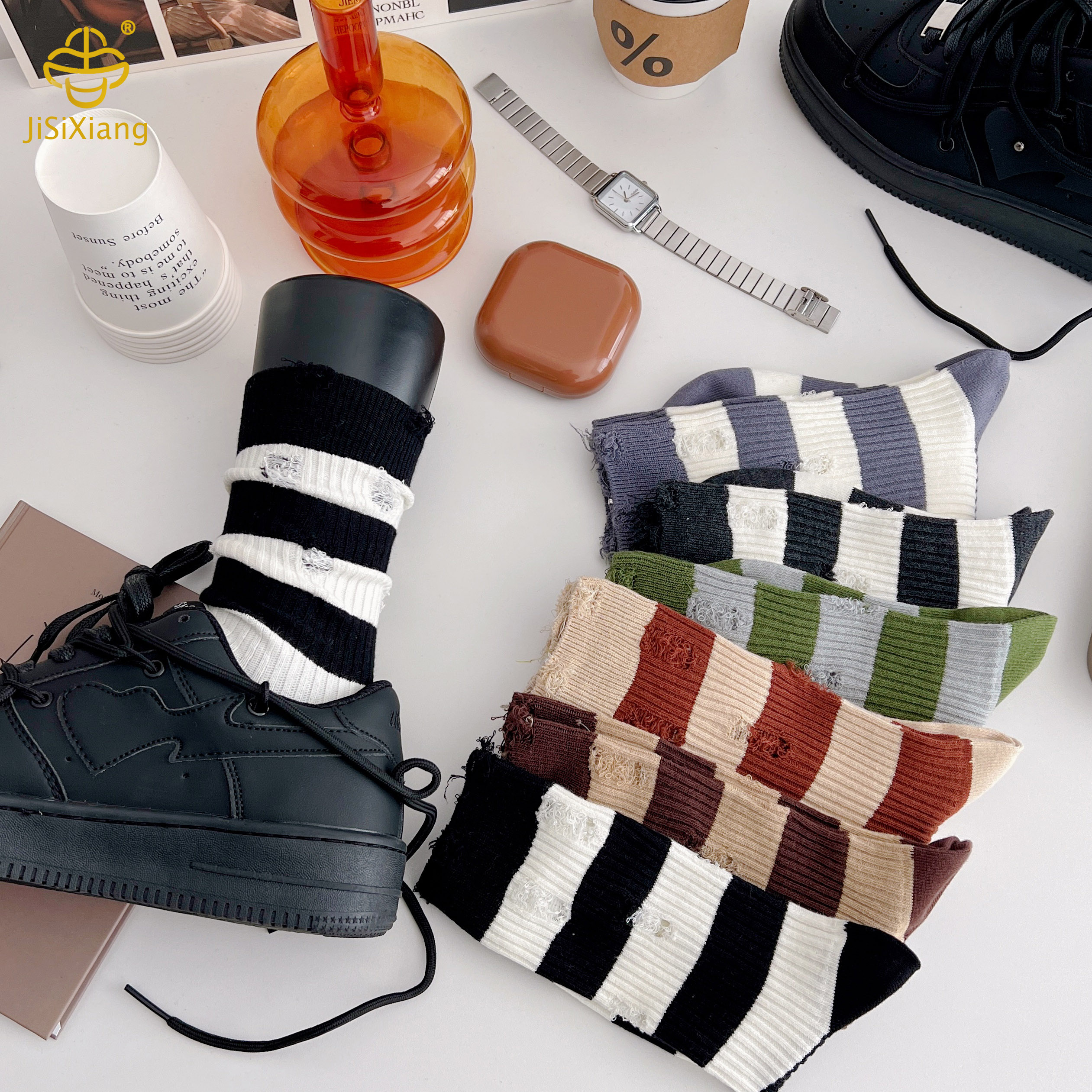 Piles of socks with holes