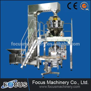 Automatic weighing and packing machine for conveyor packing system