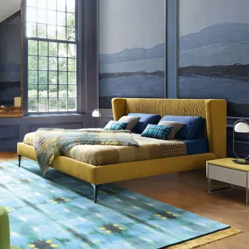 Yellow upholstered high headboard bed