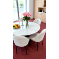 Silla de comedor moderna con respaldo de concha tapizada en color crema