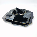 Elegante juego de platos de vaso negro irregular