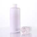 Round shoulder white lotion bottle with clear cover