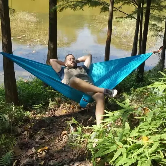 Custom Travel Camping Hammocks: Lightweight Portable Outdoor Factory Wholesales" 

However, to make it more SEO-friendly and concise, you might consider:

"Lightweight Portable Camping Hammocks - Factory Wholesale