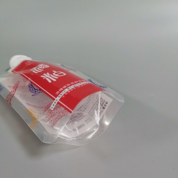 Transparent plastic used to pack liquid upright spout-bags