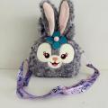 Purple Star Delo stuffed toy shoulder bag