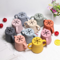 Taza de refrigerio de silicona con forma de copo de nieve, esencial para alimentación de niños pequeños
