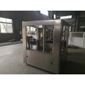 Filling and seaming machine for cans