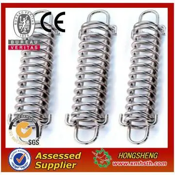 Metal coil spring spacer
