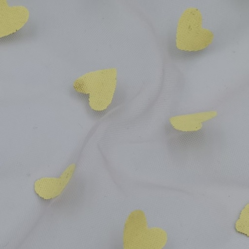 Tessuto a rete in nylon con stampa a sbuffo di cuori dorati iridescenti