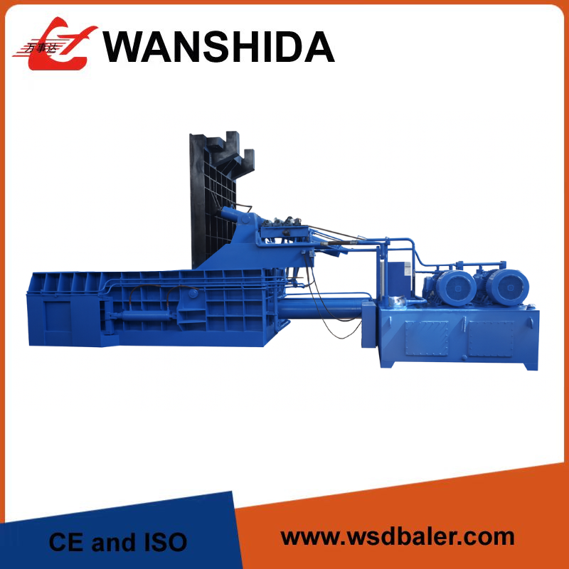 Side push out scrap baler