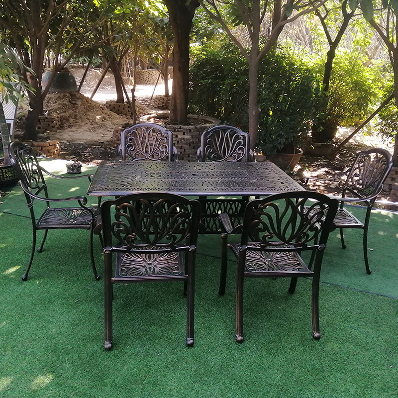 Outdoor cast aluminum tables and chairs