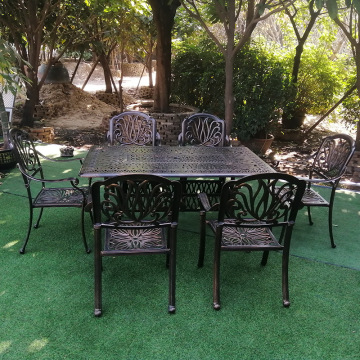 Outdoor cast aluminum tables and chairs