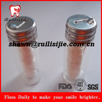 Natural silk dental flossin glass bottle case