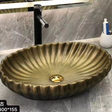 Ceramic Wash Basin with Bronze Finish and Special Design for Hotel Bathroom Sinks