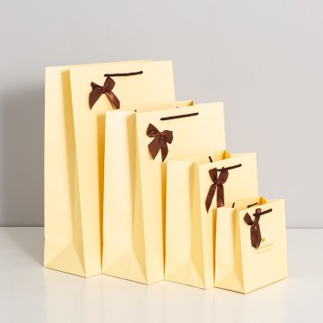 Оптовая роскошная карта Bow Card Paper Sacks для женских упаковочных подарков