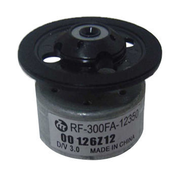 AC motor with plastic plate