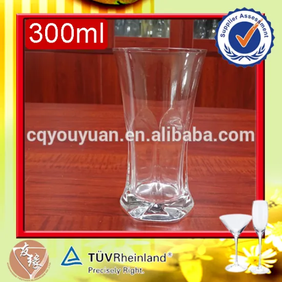 Customized attractive 300ml embossed drinkware hand cut glass tumbler