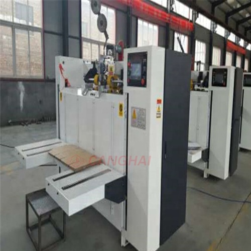 Corrugated paper stitcher machine