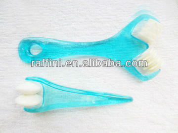 plastic roller facial massager