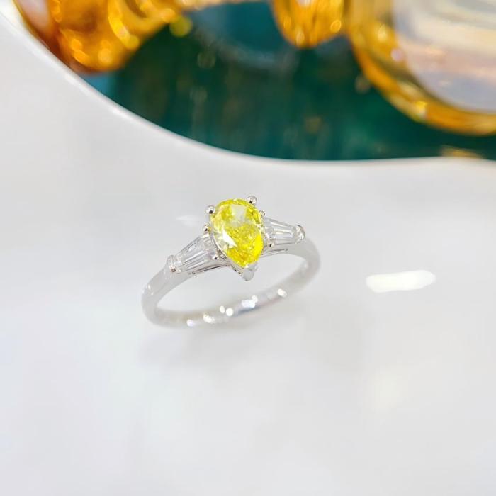 Anillo baguette cónico con diamante de laboratorio en forma de pera amarilla