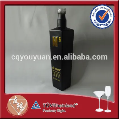 Machine blown 500ml black glass bottle of absolut vodka