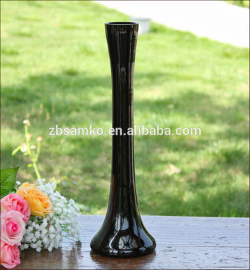 Tall black glass vase