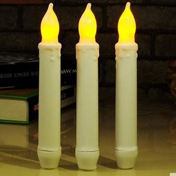 Flameless dripping flickering LED taper candle