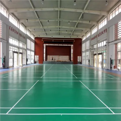 Green badminton sports flooring with white game line