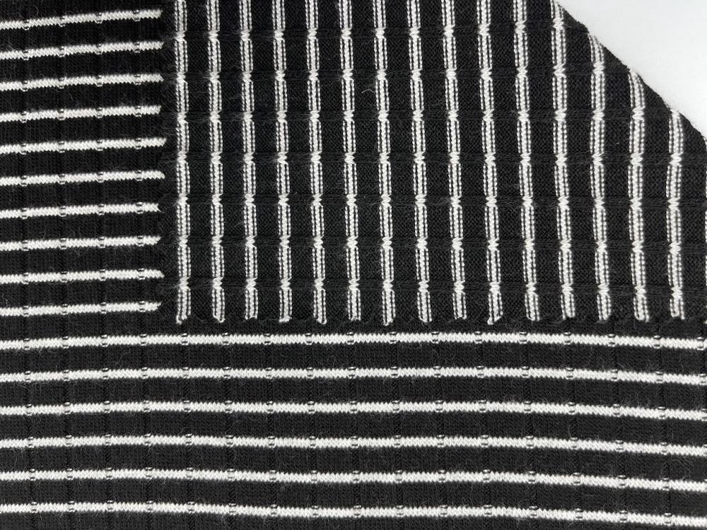 77% Rayon 19% Poliéster 4% Tecido Spandex Rib