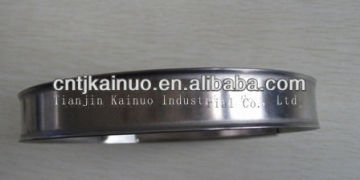 T-spring hose clamp with band rolled up