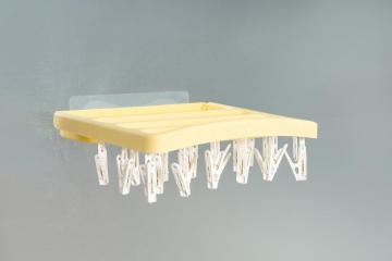 Percha de lavandería con 18 clips
