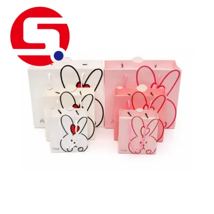 Xmas pink cellophane paper bags with handles