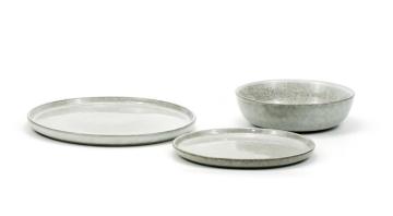 Reactive glazed stoneware dinner set in grey