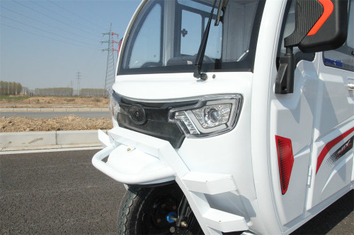 Handlebar riding electric tricycle