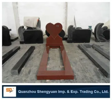 red monument with angel heart design