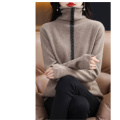 Woolen knit pullover with hem and pile neck