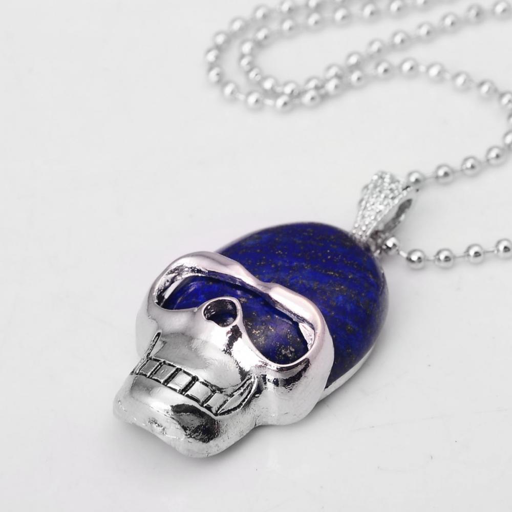 Colgante de piedras preciosas de calavera de lapislázuli con cadena de plata