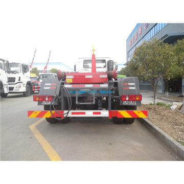 Camión de basura con gancho con caja de basura comprimida