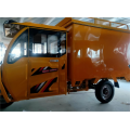 Triciclo eléctrico de cuerpo naranja