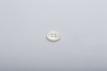 Multi-color optional four-hole shell button