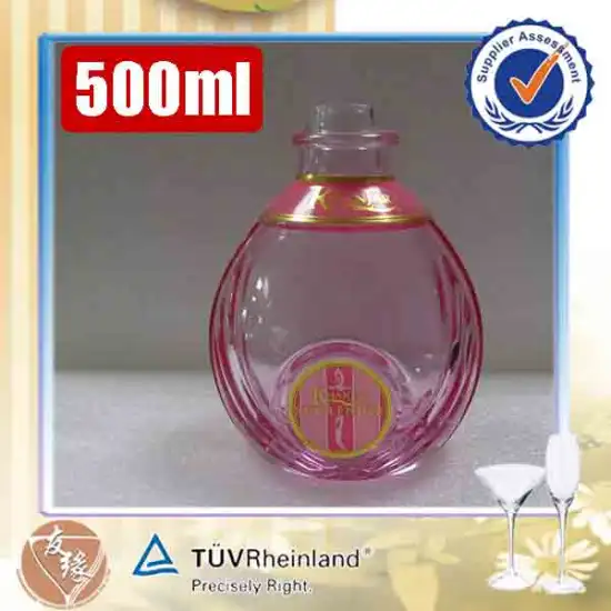 light pink color spray 500ml fancy embossed high flint glass unique shaped liquor bottles