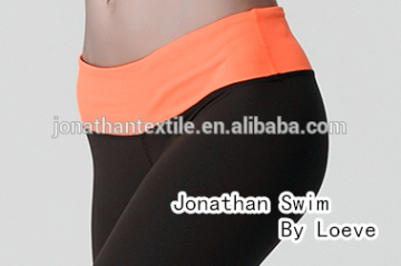Women sports pants made of stretch nylon spandex fabric, yoga leggings for fitness wholesale