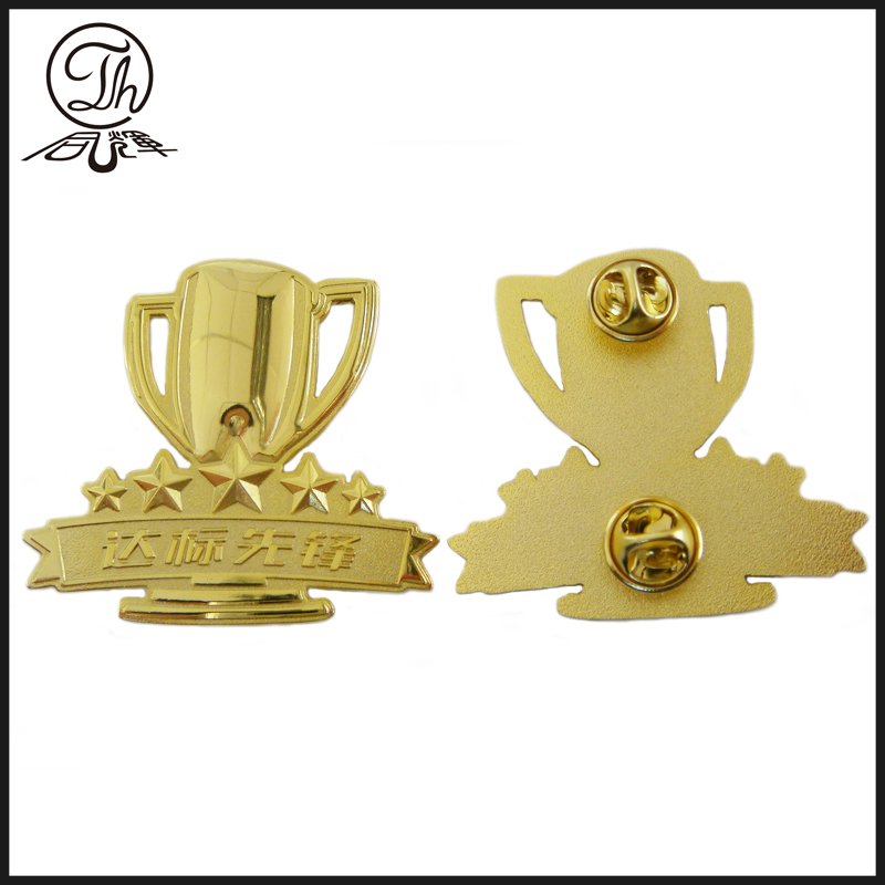 Gold trophy cup metal badge