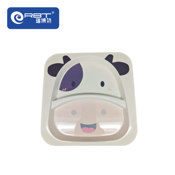 牛の漫画クリエイティブなかわいいホームボウルとプレート