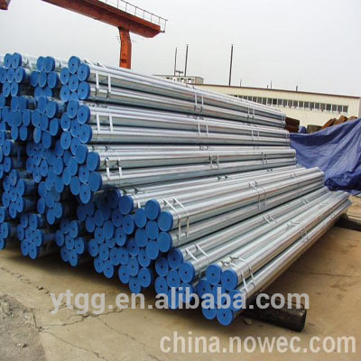 Galvanized steel pipe with coupling , threaded on both ends, plactic caps