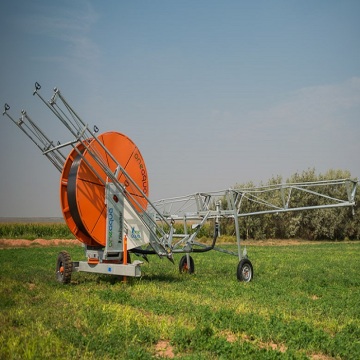 Hose reel irrigation system for vegetable garden