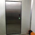 Insulated cold room hinged door